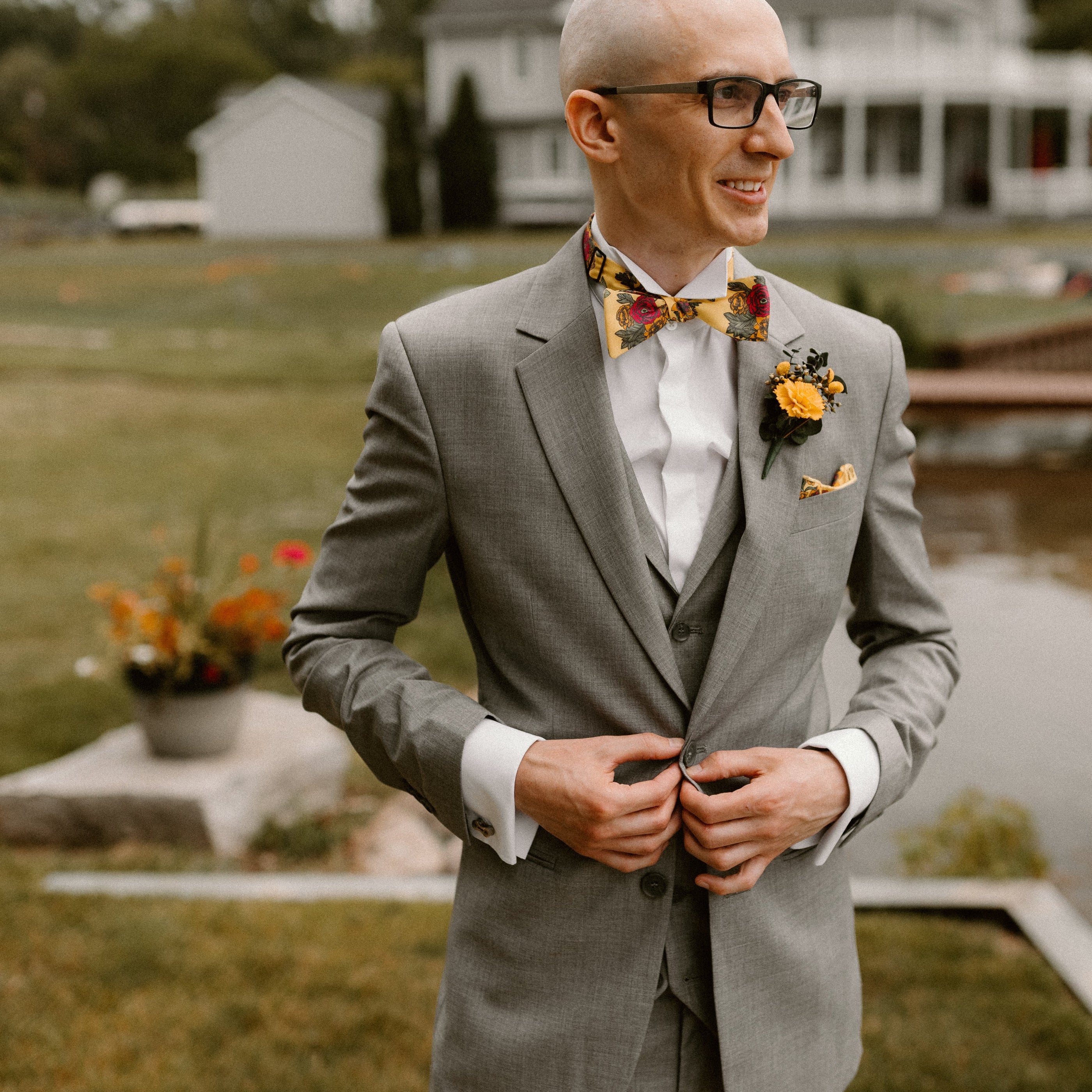 photo of man wearing suspenders under suit jacket